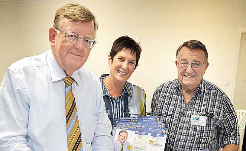 Hinkler LNP candidate Paul Neville gets ready for election day with Cathy Heidrich and John Rutherford. Hinkler LNP candidate Paul Neville gets ready for election day with Cathy Heidrich and John Rutherford.